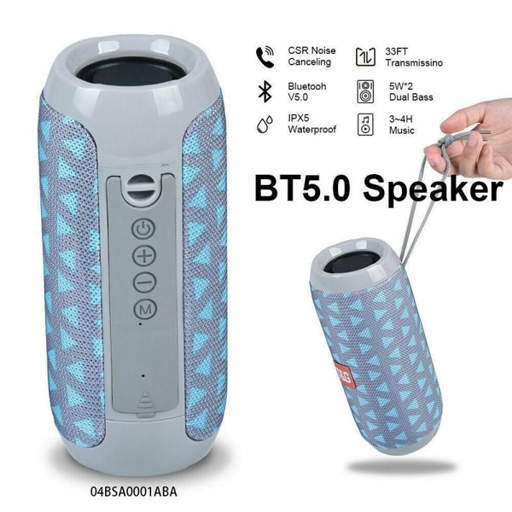 a bt5.0 speaker is being held in someone 's hand