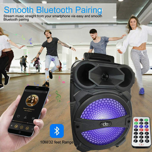 a person holding a cell phone next to a speaker that says smooth bluetooth pairing