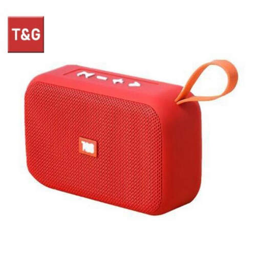 a red t & g portable speaker with a handle on a white background .