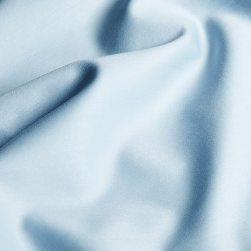 a close up of a piece of light blue fabric