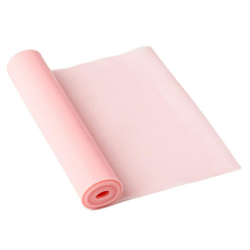 a roll of pink rubber bands on a white background .