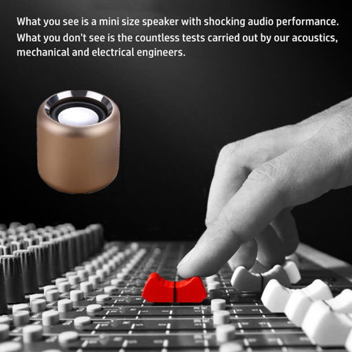 a person pressing a red button on a keyboard with the words what you see is a mini size speaker with shocking audio performance