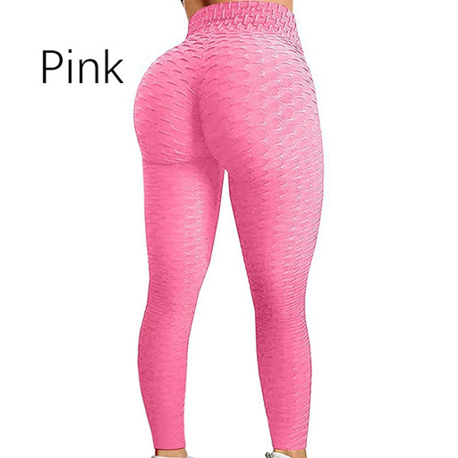 a woman is wearing a pair of pink leggings .