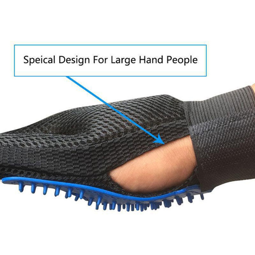 a person is wearing a black glove with a blue rubber brush on it .