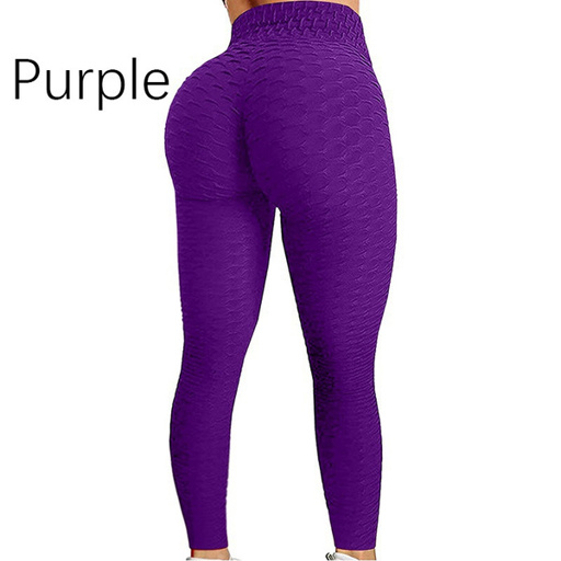 a woman is wearing a pair of purple leggings .