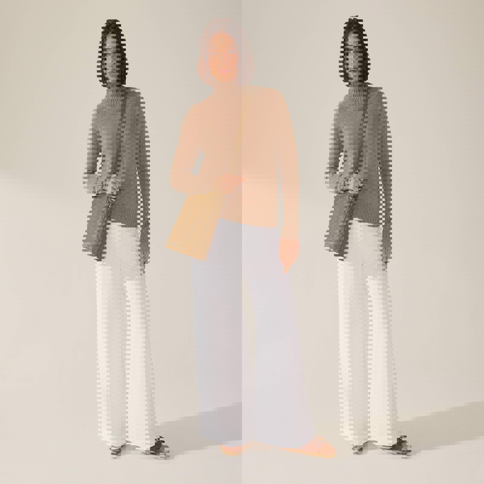 a woman wearing a brown sweater and white pants