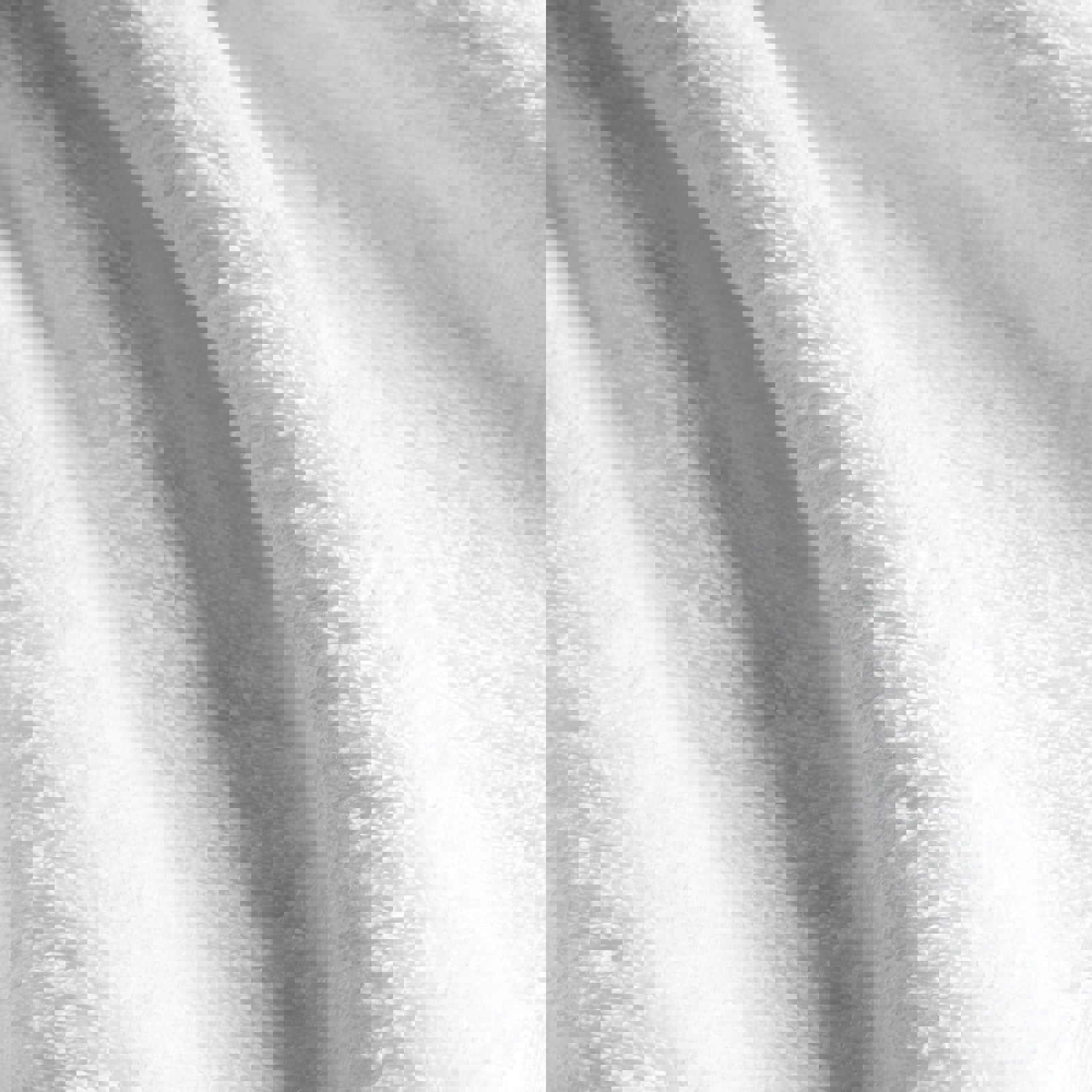 a close up of a white towel showing the texture