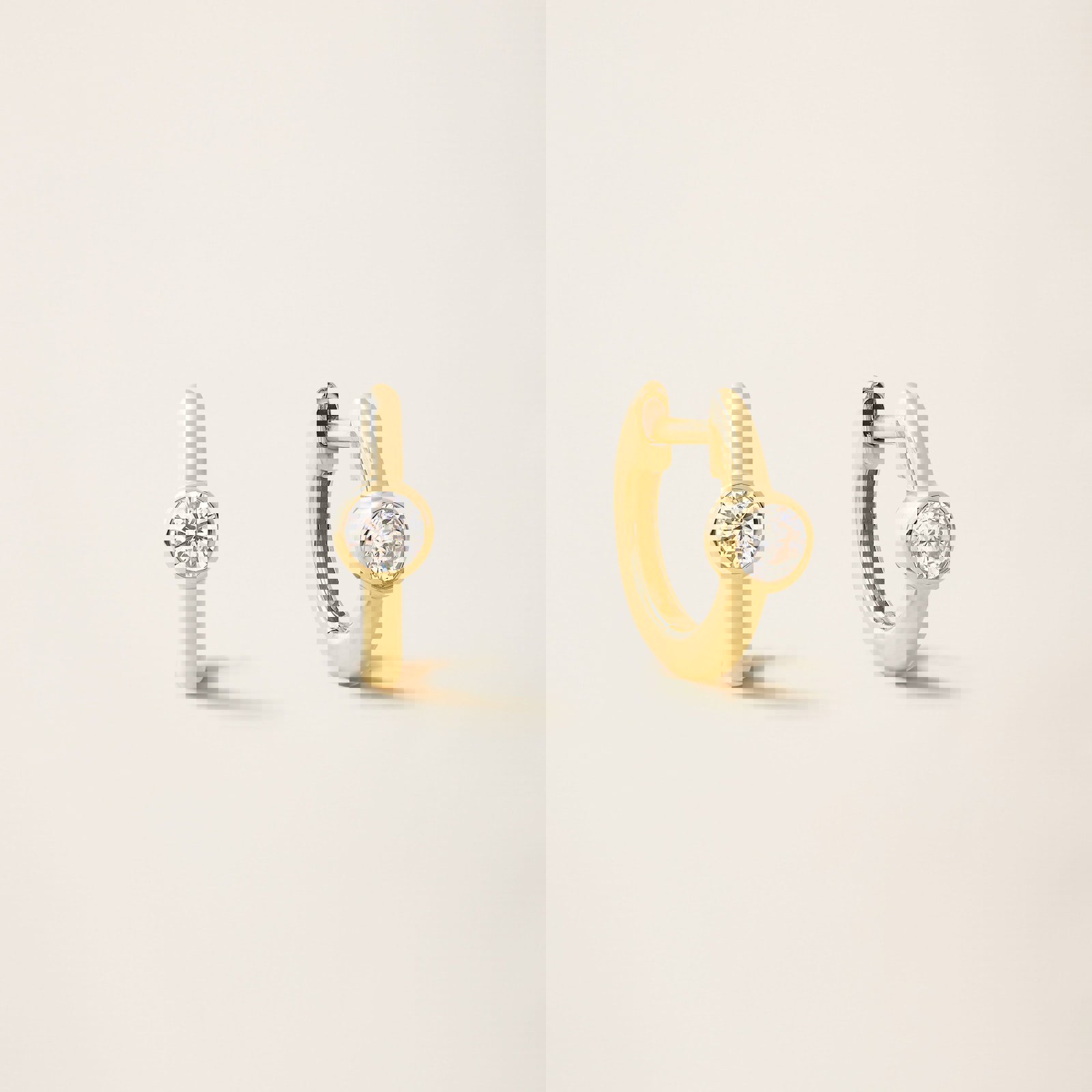 a pair of yellow gold hoop earrings with diamonds