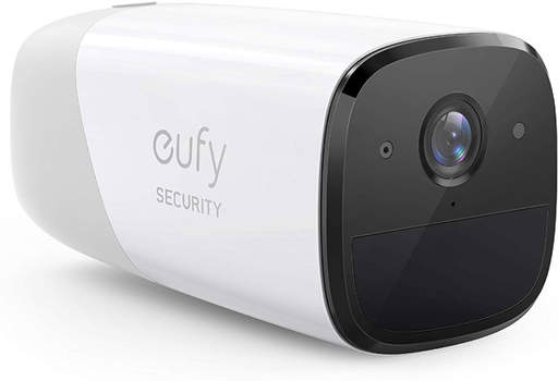 a cufy security camera is sitting on a white surface