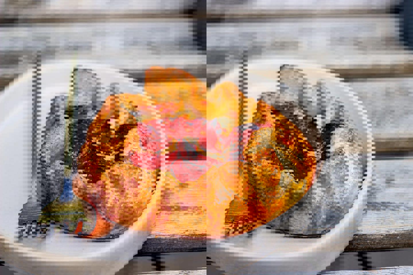 a white plate with a pie and a fork on it