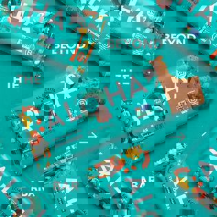 a close up of a aloha bar with a bite taken out of it