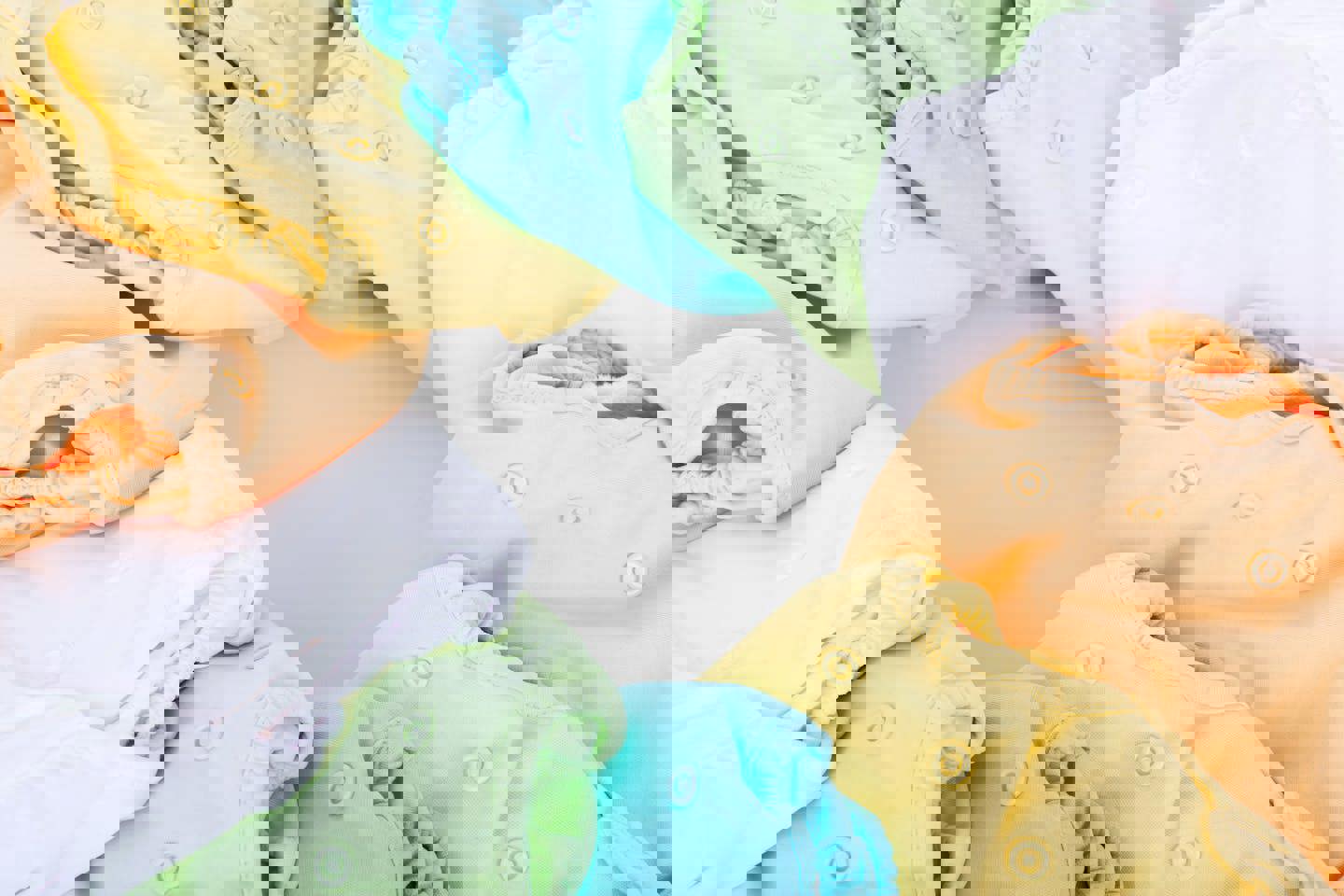 a bunch of diapers are stacked on top of each other