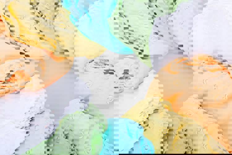 a bunch of diapers are stacked on top of each other