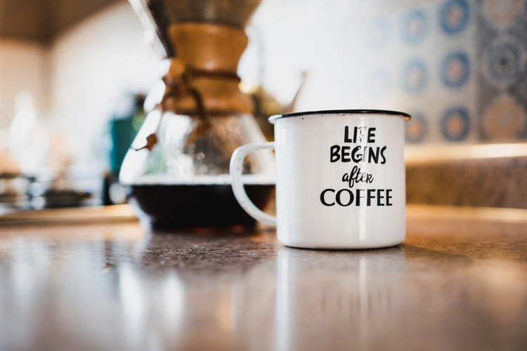 a coffee mug that says life begins after coffee