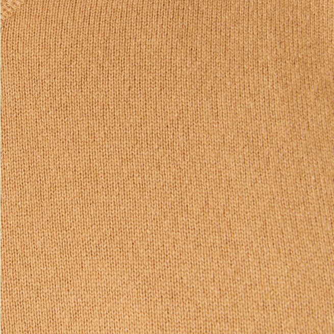 a close up of a tan knitted fabric