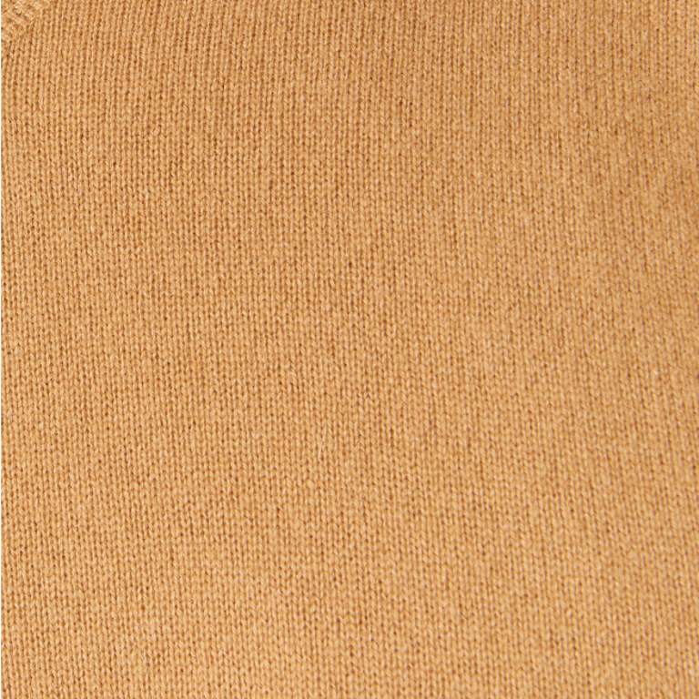 a close up of a tan knitted fabric