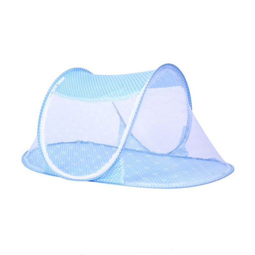 a blue mosquito net with white polka dots on it