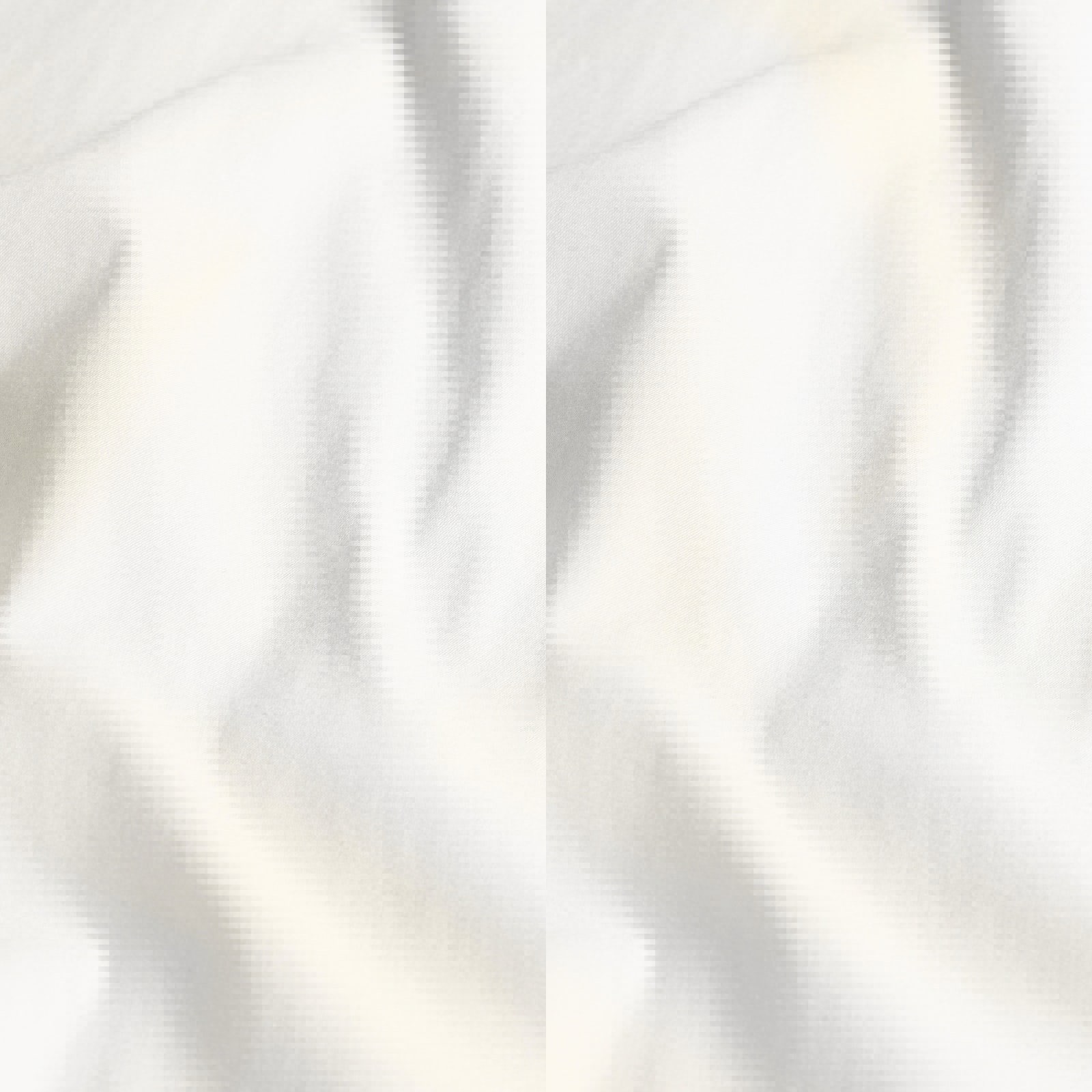 a close up of a piece of white fabric .