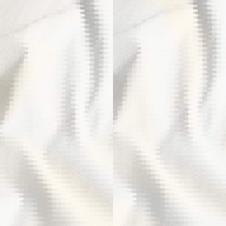 a close up of a piece of white fabric .