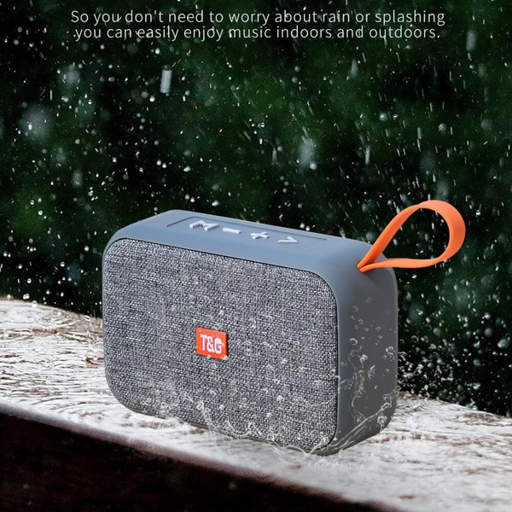 a t & g speaker is sitting in the rain