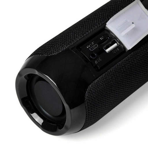 a black speaker has a usb port and a sd card slot