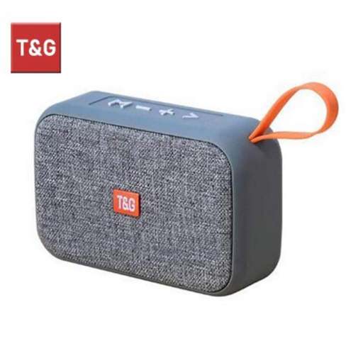 a t & g portable speaker with a handle on a white background .