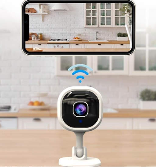 a camera is connected to a cell phone in a kitchen