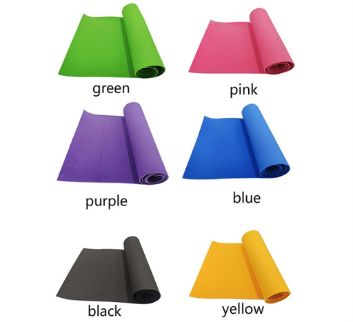 a green pink purple blue black and yellow yoga mat