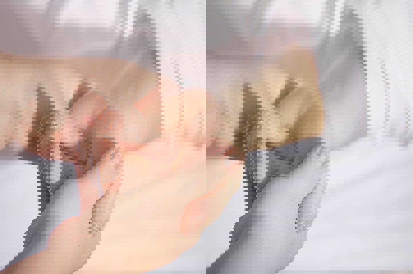 a person is giving another person a hand massage