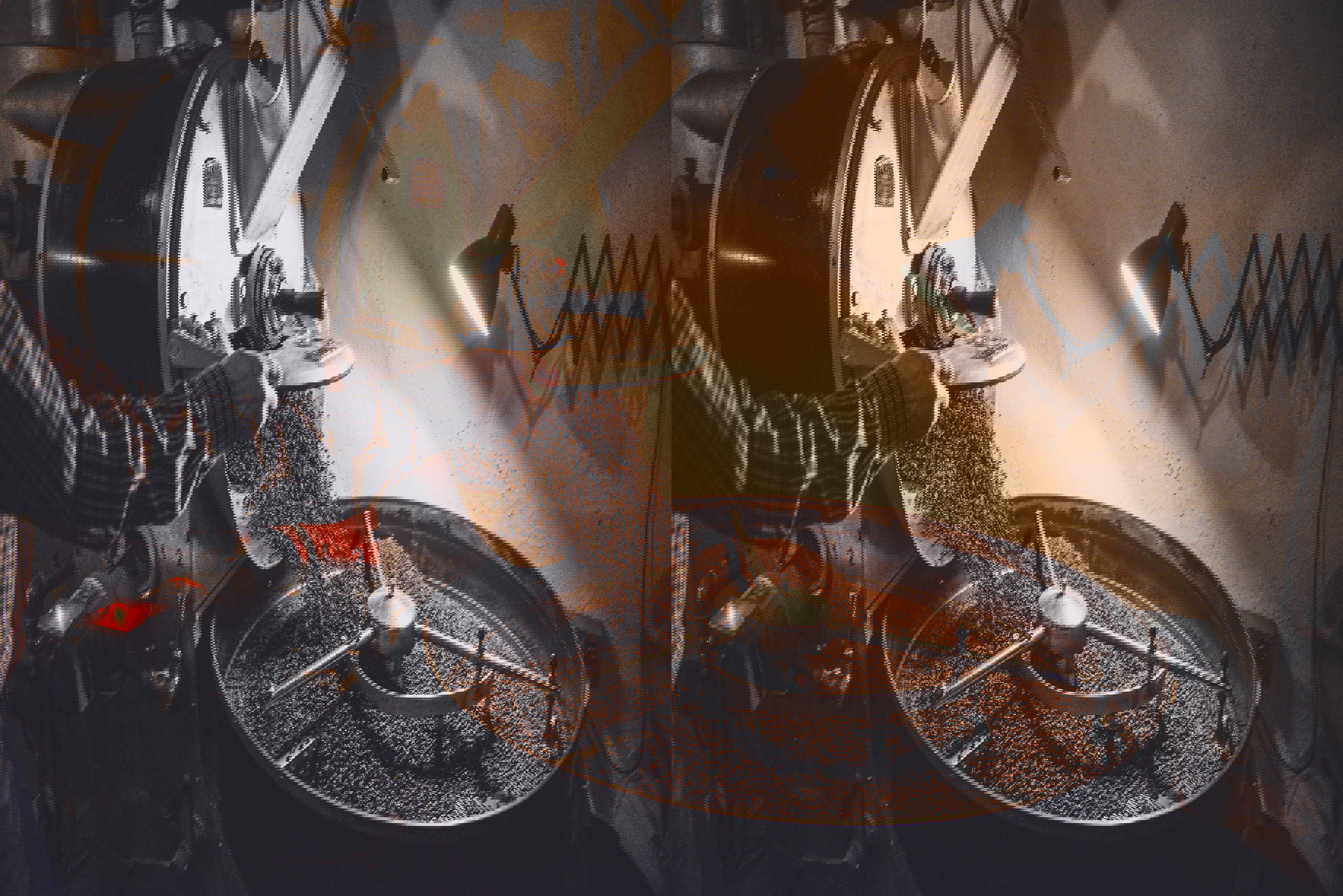 a man is roasting coffee beans in a machine with a label that says ' a ' on it