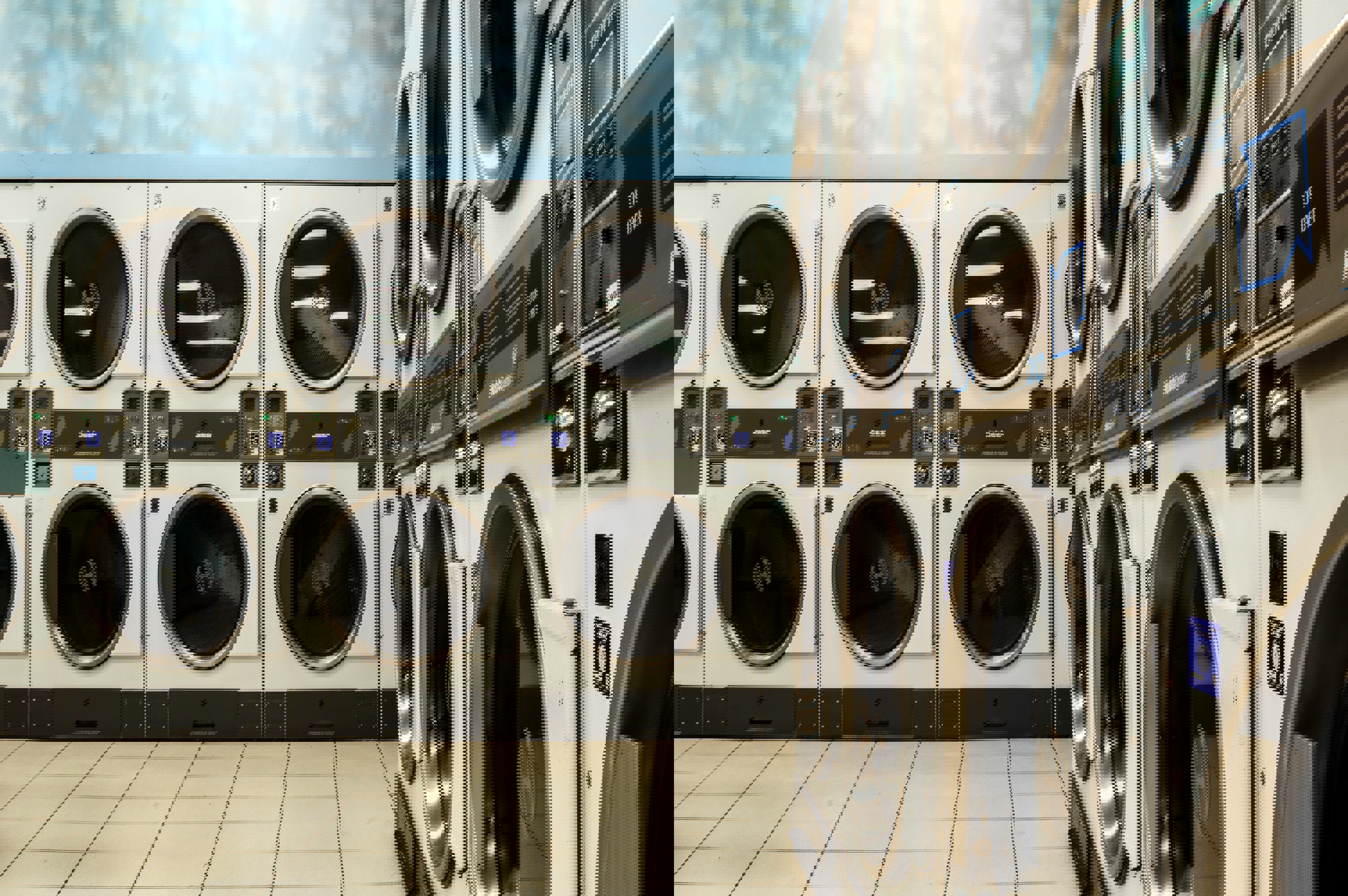 a laundromat has a machine that says dryer on it