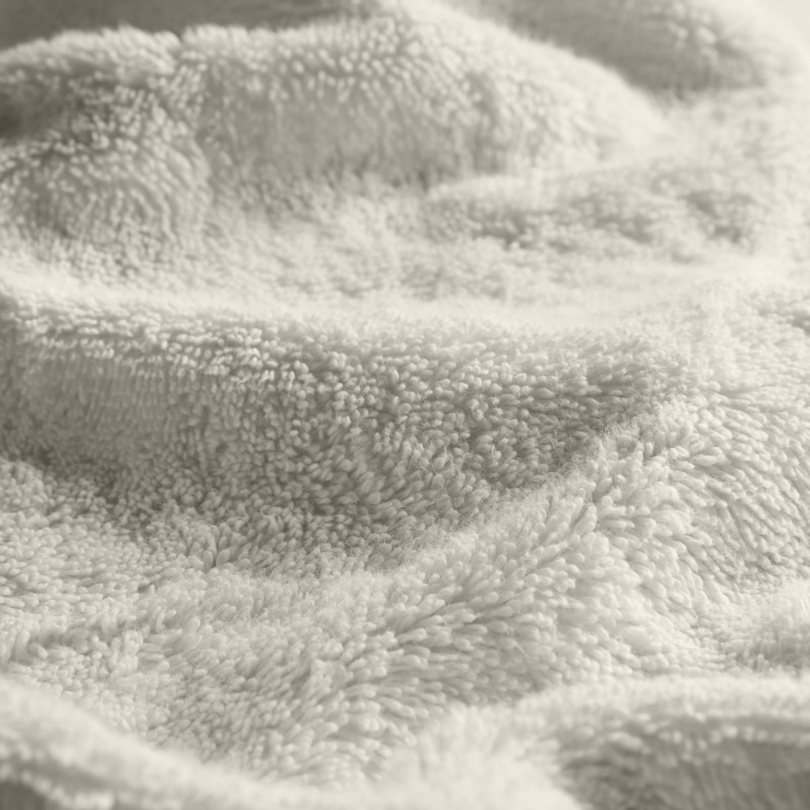 a close up of a white towel showing the texture